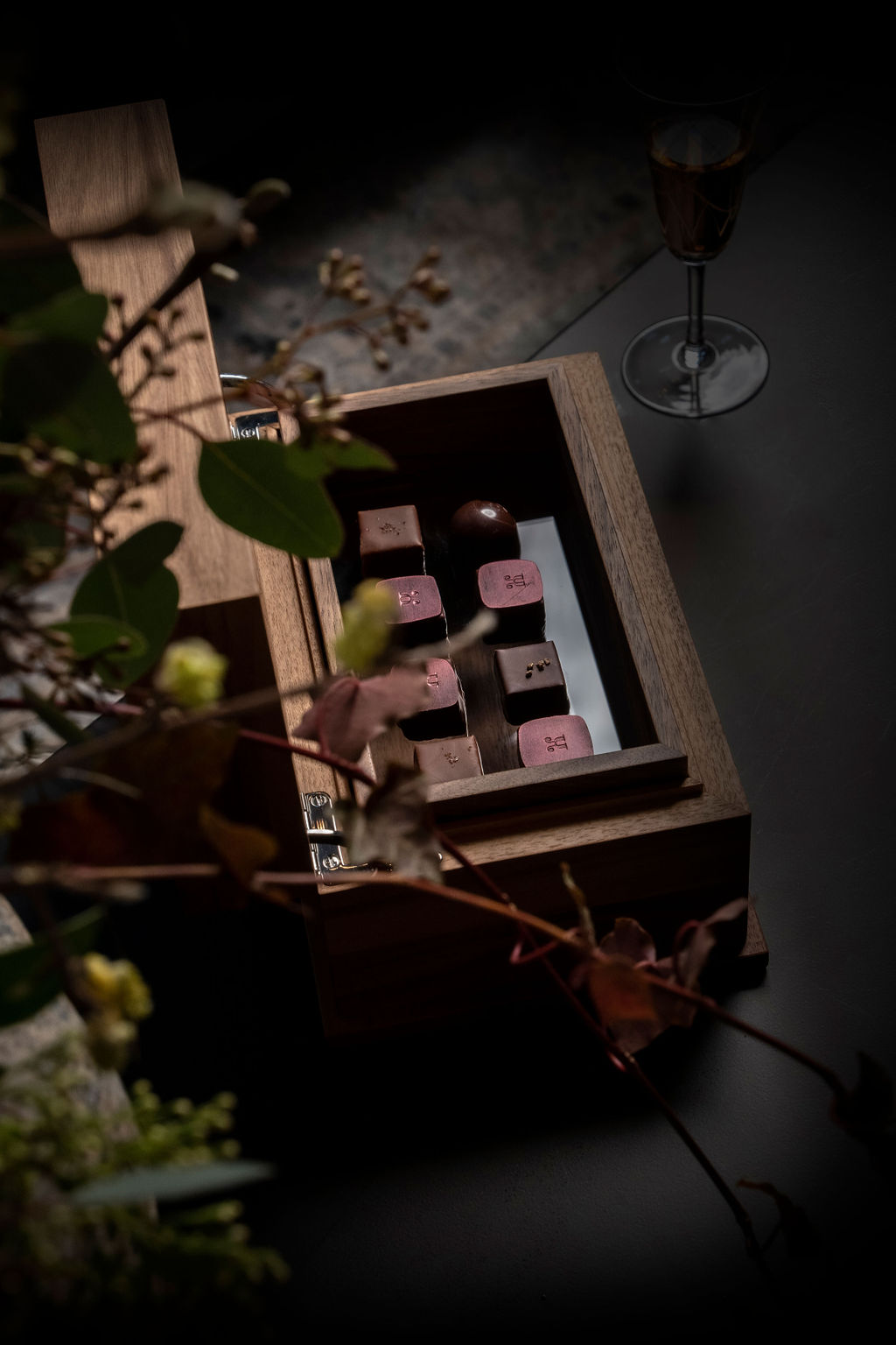 Open box displaying an elegant assortment of handcrafted Swiss chocolates