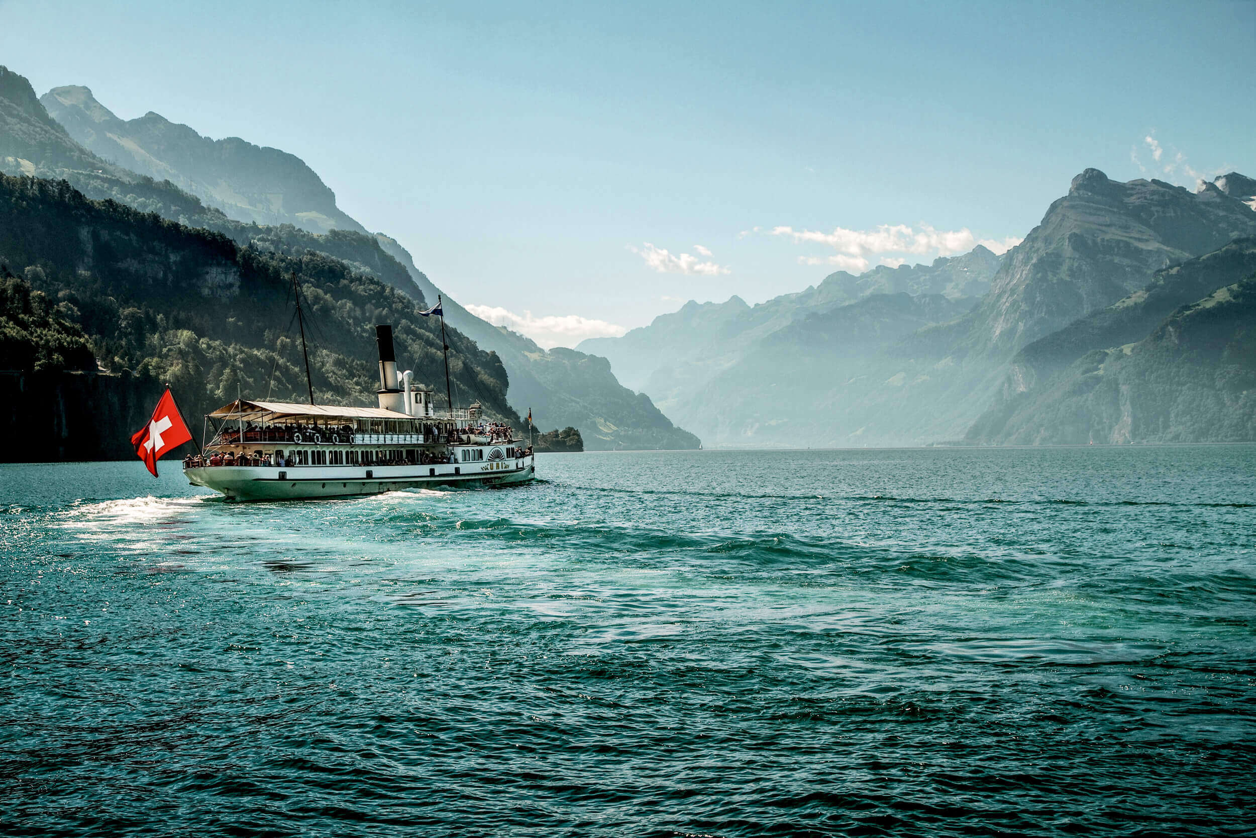 Swiss paddle steamer on Lake Lucerne with panoramic mountain views