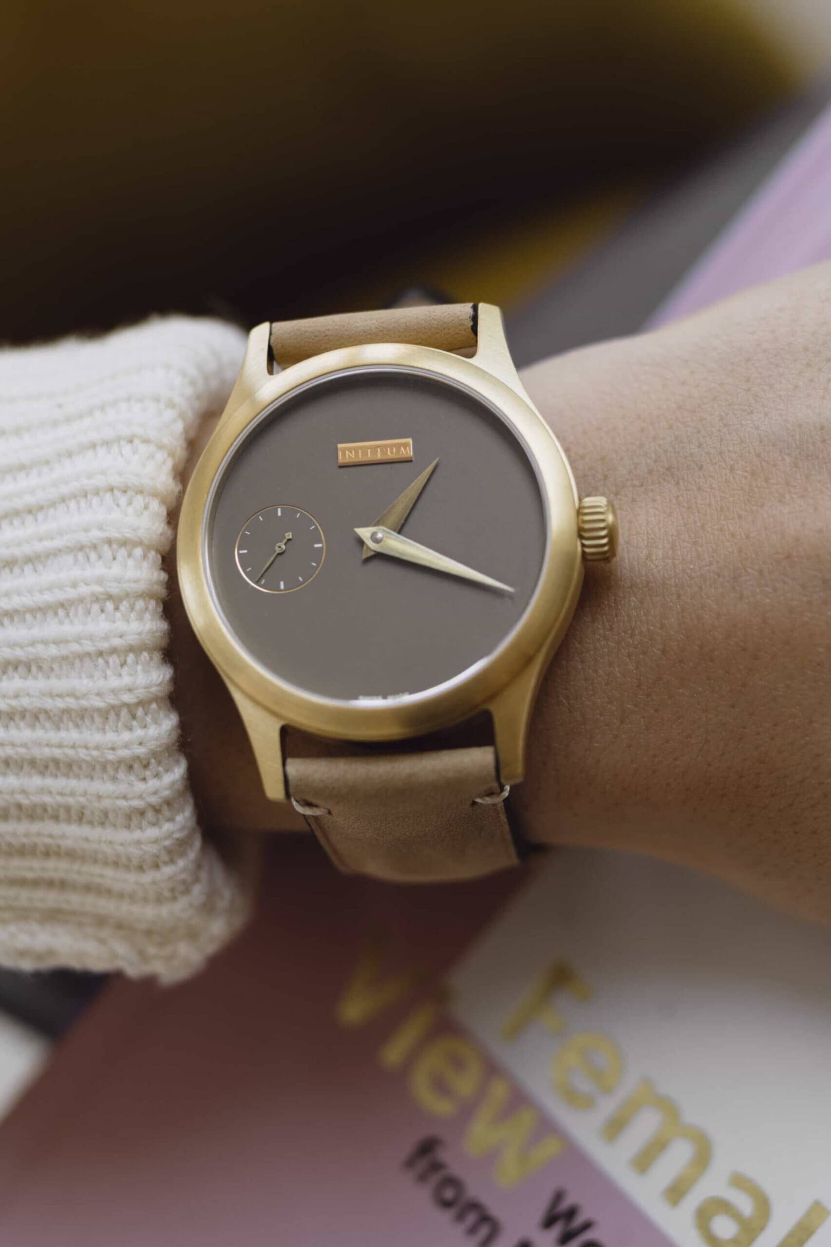 Handcrafted manual watch from a Swiss watchmaking workshop worn on the wrist