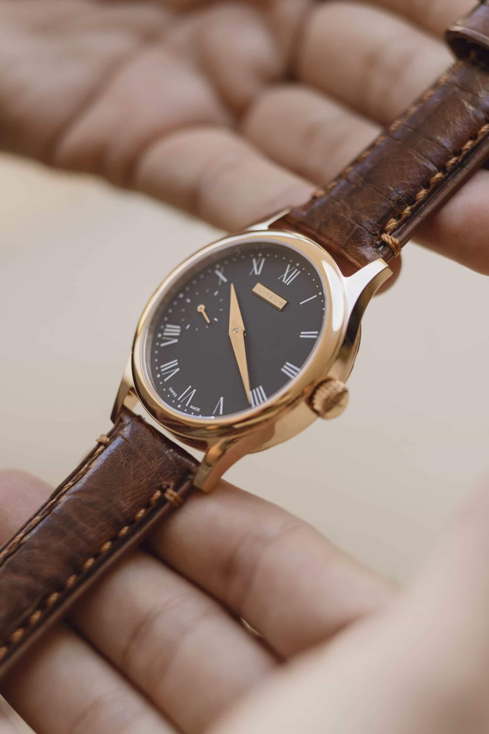 Participant assembling a manual watch model during an exclusive Swiss watchmaking workshop